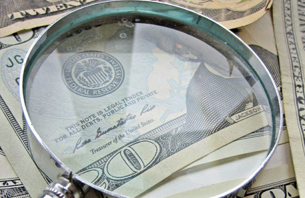 dollars-magnifying-glass_blog
